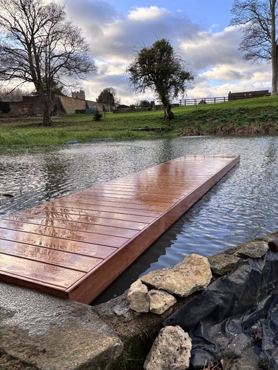 Private pond with jetty constructed and installed by RA Marine Ltd