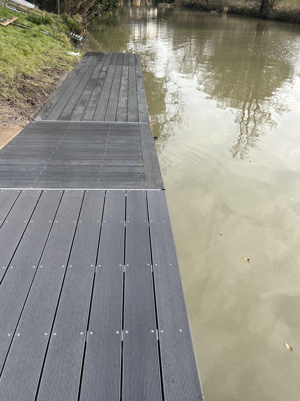 Two-level dock solution to handle varying water levels and craft sizes.