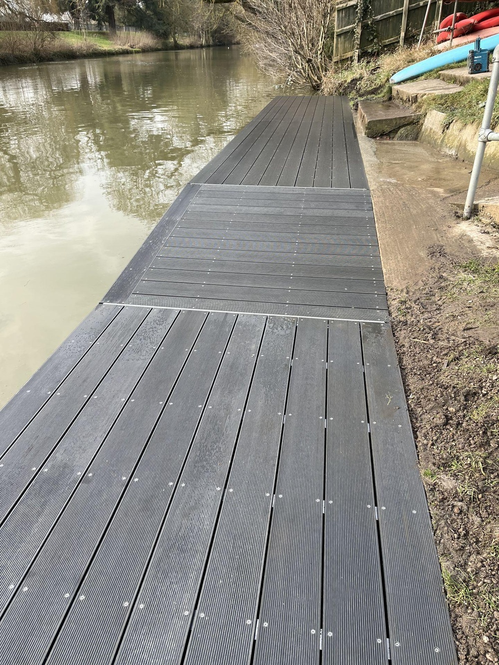 Jetty refurbishment project: replacing old timber with low-maintenance materials.